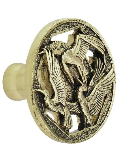 Crane Dance Cabinet Knob in Brite Brass.